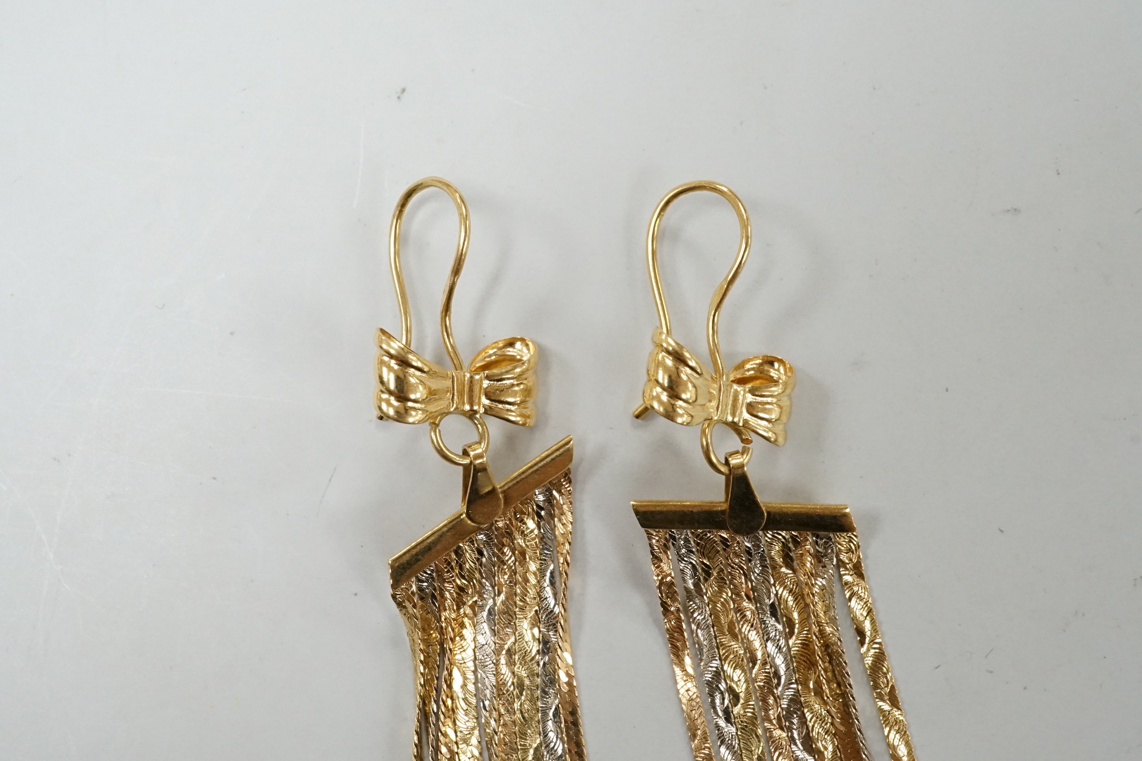 A modern pair of three colour 750 graduated tassel drop earrings, overall 95mm, 8.7 grams.